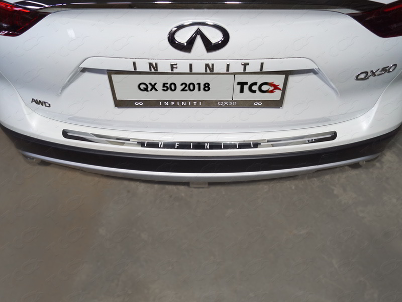 INFINITI QX 50 2018- Накладка на задний бампер (лист зеркальный надпись Infiniti) Обвес для INFINITI QX 50 2018- Накладка на задний бампер (лист зеркальный надпись Infiniti)